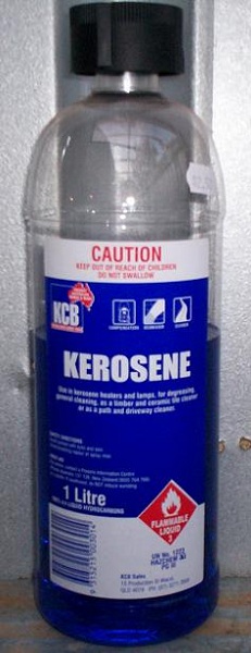  A kerosene bottle, containing blue dyed kerosene. In the U.S., kerosene is typically in a blue (or blue labeled) container. 
